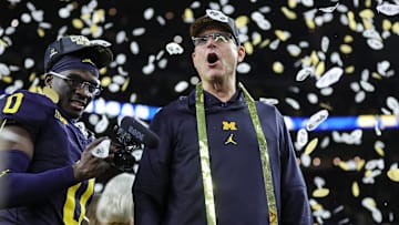 Michigan head coach Jim Harbaugh celebrates during the trophy presentation after the 34-13 win over Washington at the national championship game at NRG Stadium in Houston on Monday, Jan. 8, 2024.