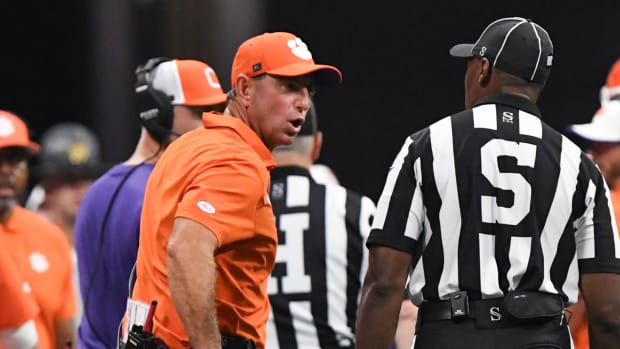 Dabo Swinney argues with an official during Clemson's season opening loss to Georgia.