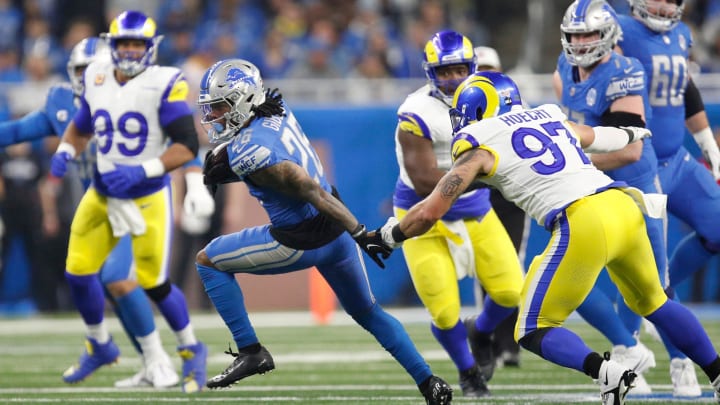 Detroit Lions running back Jahmyr Gibbs (26) runs the ball in the first half against the L.A. Rams 