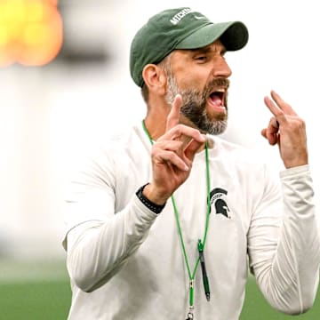 Michigan State's defensive coordinator Joe Rossi gives instructions while working with linebackers during camp on Monday, Aug. 5, 2024, at the indoor practice facility in East Lansing.