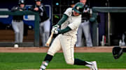Michigan State's Sam Busch gets a hit against the Lugnuts in the first inning on Tuesday, April 1, 2025, during the Crosstown Showdown at Jackson Field in Lansing.