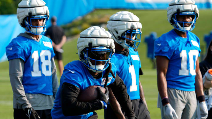 Detroit Lions wide receiver Daurice Fountain runs during drills 