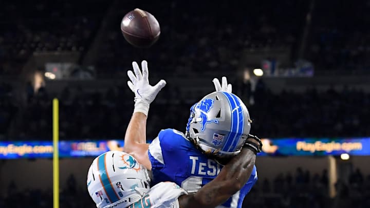 Aug 16, 2025; Detroit, Michigan, USA; Detroit Lions wide receiver Isaac TeSlaa (18) scores a touchdown against the Miami Dolphins in the second quarter at Ford Field. Mandatory Credit: Eamon Horwedel-Imagn Images