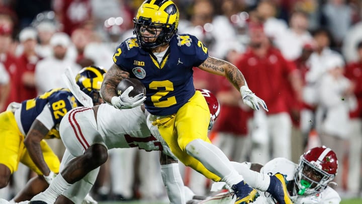 Michigan running back Blake Corum (2) runs against Alabama during the second half of their College Football Playoff semifinal game at the 2024 Rose Bowl in Pasadena, Calif.