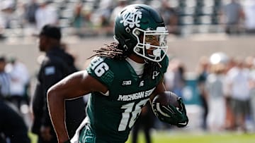 Michigan State wide receiver Christian Fitzpatrick (16) warms up before the Maryland game at Spartan Stadium in East Lansing on Saturday, Sept. 23, 2023.