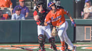 Clemson catcher Jacob Jarrell (9) hits a home run against University of Louisville during the bottom of the fifth inning at Doug Kingsmore Stadum in Clemson, S.C. Friday, April 18, 2025. The home run broke up a no-hitter and helped the Tigers win 2-1.