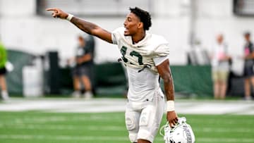 Michigan State's Malik Spencer communicates with teammates during camp on Monday, Aug. 5, 2024, at the indoor practice facility in East Lansing.