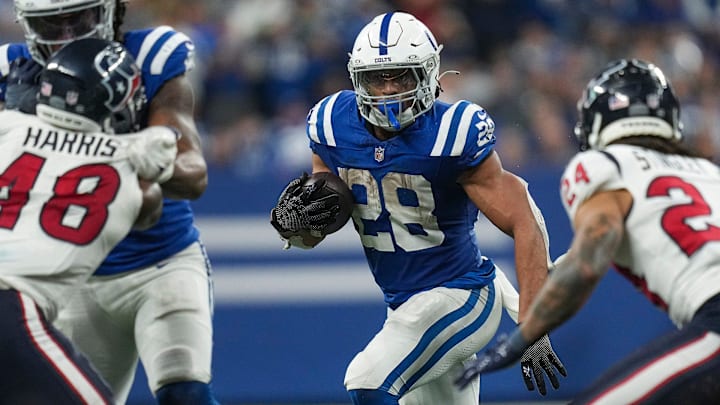 Indianapolis Colts running back Jonathan Taylor (28) runs the ball on Saturday, Jan. 6, 2024, during a game against the Houston Texans at Lucas Oil Stadium in Indianapolis.