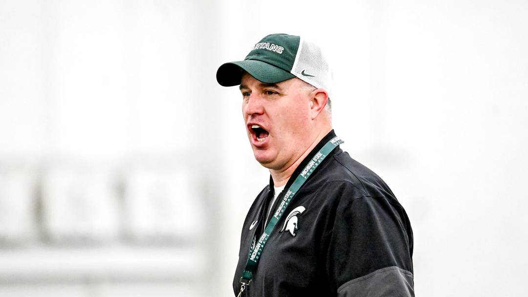Michigan State's head coach Pat Fitzgerald calls out to players during spring football practice on Tuesday, April 14, 2026, in East Lansing.