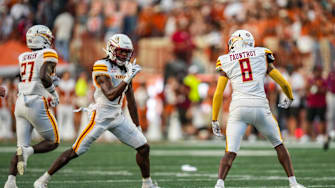 Louisiana Monroe Warhawks cornerback Car'lin Vigers (1) and Louisiana Monroe Warhawks defensive back Carl Fauntroy (8) celebrate after intercepting the ball as the Texas Longhorns take on ULM at Darrell K Royal-Texas Memorial Stadium in Austin Saturday, Sept. 21, 2024.