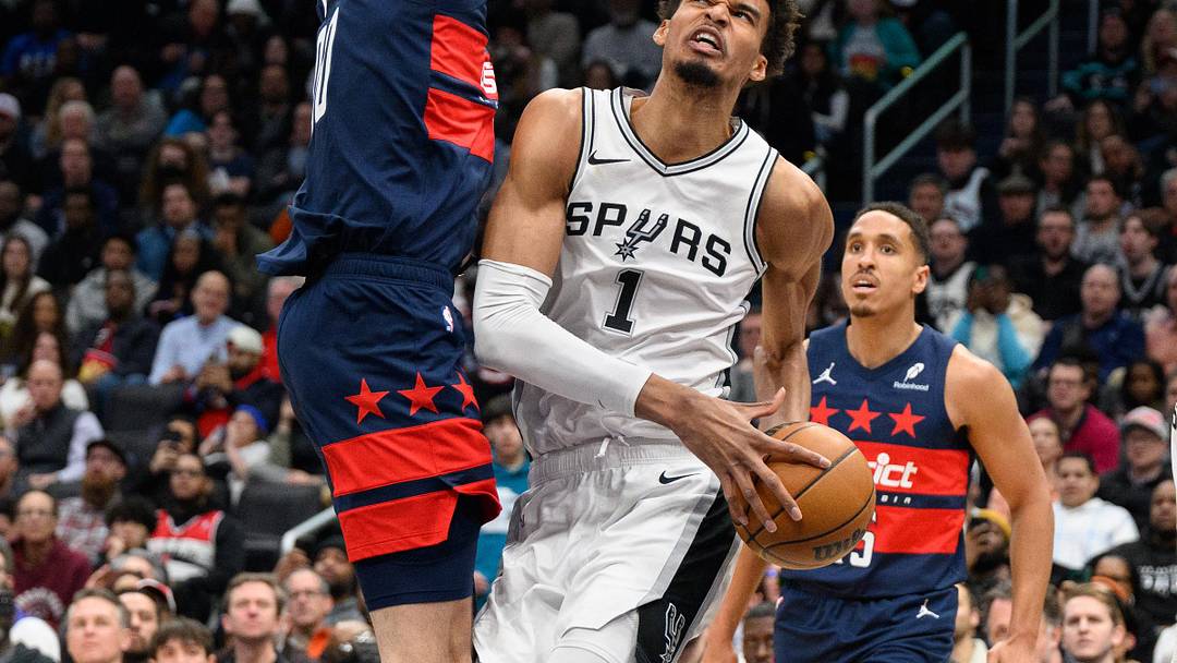 Feb 10, 2025; Washington, District of Columbia, USA; San Antonio Spurs center Victor Wembanyama (1) drives to the basket against Washington Wizards forward Tristan Vukcevic (00) during the second quarter at Capital One Arena. Mandatory Credit: Reggie Hildred-Imagn Images