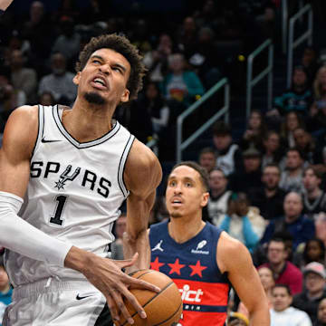 Feb 10, 2025; Washington, District of Columbia, USA; San Antonio Spurs center Victor Wembanyama (1) drives to the basket against Washington Wizards forward Tristan Vukcevic (00) during the second quarter at Capital One Arena. Mandatory Credit: Reggie Hildred-Imagn Images