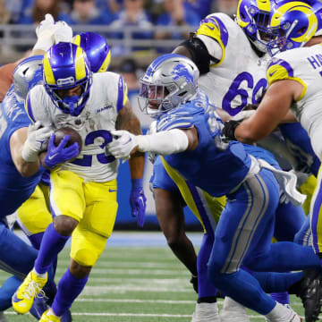 L.A. Rams running back Kyren Williams (23) runs the ball during the fourth quarter of the wild-card round of the NFL playoffs at Ford Field in Detroit on Sunday, Jan. 14, 2024.