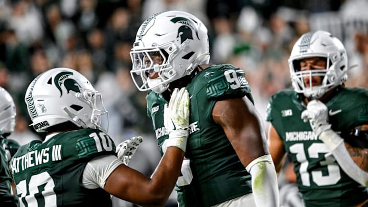 Michigan State's Jalen Thompson, right, celebrates his tackle for a safety against Western Michigan during the third quarter on Friday, Aug. 29, 2025, in East Lansing.