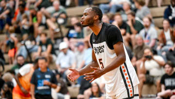 Michigan State and Team Snipes' Tre Holloman jokes around in the game against Team Faygo on Tuesday, June 25, 2024, during the Moneyball Pro-Am at Holt High School.