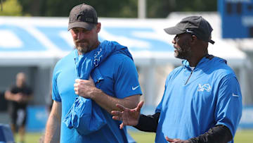 Lions GM Brad Holmes (right) and coach Dan Campbell talk after training camp in Allen Park on Thursday, July 29, 2021.

Lions