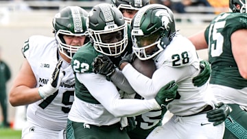 Michigan State's Bai Jobe, left, tackles Brandon Tullis during the Spring Showcase on Saturday, April 20, 2024, at Spartan Stadium in East Lansing.