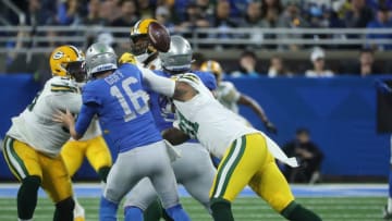 Detroit Lions quarterback Jared Goff fumbles after the hit by Green Bay Packers linebacker Preston Smith during the first half at Ford Field on Nov. 23, 2023.
