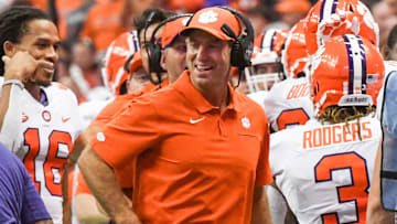 Clemson Head Coach Dabo Swinney smiles after Clemson wide receiver Amari Rodgers (3) scored a touchdown during the first quarter at the Carrier Dome in Syracuse, New York, Saturday, September 14, 2019.

Clemson Football Syracuse 1h