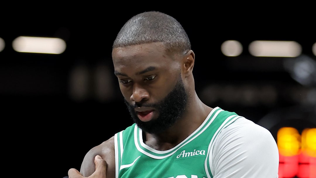 Nov 18, 2025; Brooklyn, New York, USA; Boston Celtics guard Jaylen Brown (7) holds his right shoulder during the second quarter against the Brooklyn Nets at Barclays Center. Mandatory Credit: Brad Penner-Imagn Images