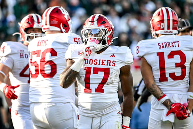 Indiana’s Ty Son Lawton silences the crowd after a touchdown run against Michigan State last month.