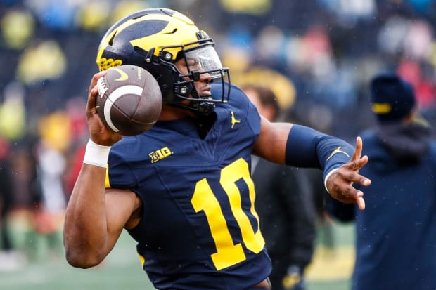 Michigan quarterback Alex Orji (