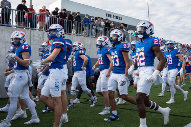 Westlake head in at half time in the 6A UIL high school football semifinal game in Pflugerville on Dec. 9, 2023.