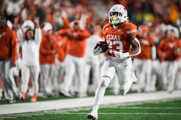 Texas running back Jaydon Blue scores a touchdown against the Texas Tech Red Raiders.