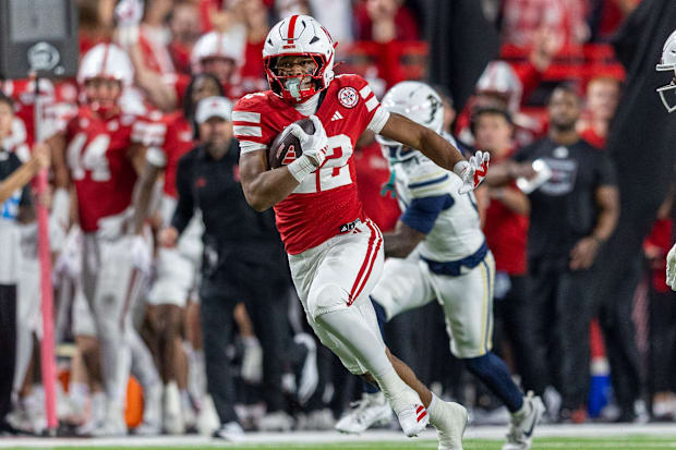 Nebraska running back Isaiah Mozee races 39 yards on a catch from quarterback TJ Lateef against Akron.