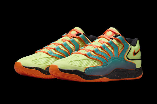 Kevin Durant's green and orange Nike sneakers.
