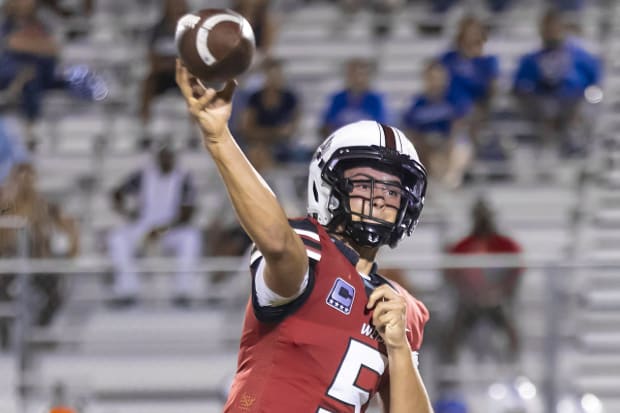 Weiss QB Jax Brown throws a pass downfield during a 12-6A football game on Sept 29,20 2023 in Pflugerville, Texas.