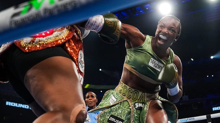Claressa Shields, right, throws a punch against Franchon Crews-Dezurn 