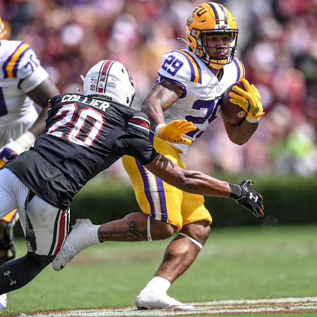 LSU freshman Caden Durham (29) runs near South Carolina defensive back Judge Collier (20) in a 36-33 win on Saturday.