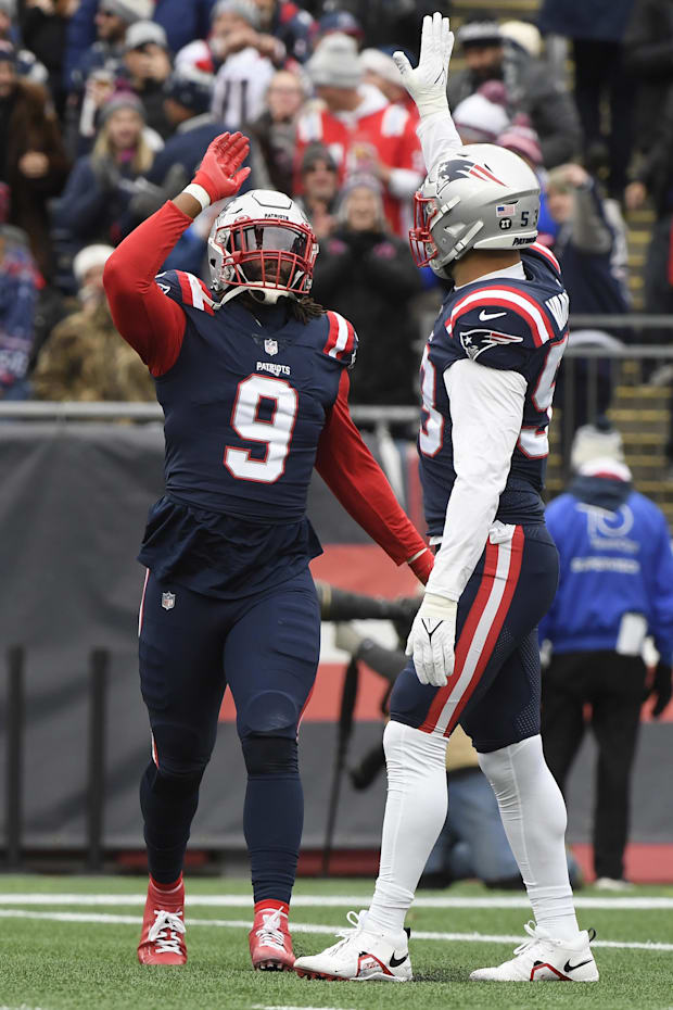 New England Patriots outside linebacker Matt Judon high fives middle linebacker Kyle Van Noy New England Patriots outside linebacker Matt Judon high fives middle linebacker Kyle Van Noy