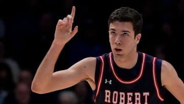 Robert Morris Colonials forward Alvaro Folgueiras (7) celebrates a three point shot in the first half of the NCAA Men   s basketball game between the Xavier Musketeers and the Robert Morris Colonials at the Cintas Center in Cincinnati on Monday, Nov. 6, 2023.