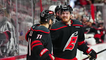 May 12, 2025; Raleigh, North Carolina, USA; Carolina Hurricanes left wing Taylor Hall (71) celebrates his goal with center Jack Roslovic (96) against the Washington Capitals during the third period in game four of the second round of the 2025 Stanley Cup Playoffs at Lenovo Center. Mandatory Credit: James Guillory-Imagn Images