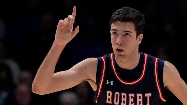 Robert Morris Colonials forward Alvaro Folgueiras (7) celebrates a three point shot in the first half of the NCAA Men   s basketball game between the Xavier Musketeers and the Robert Morris Colonials at the Cintas Center in Cincinnati on Monday, Nov. 6, 2023.