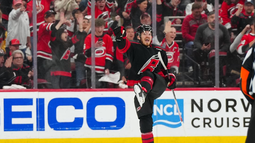 May 10, 2025; Raleigh, North Carolina, USA; Carolina Hurricanes center Jack Roslovic (96) celebrates his goal against the Washington Capitals during the second period in game three of the second round of the 2025 Stanley Cup Playoffs at Lenovo Center. Mandatory Credit: James Guillory-Imagn Images