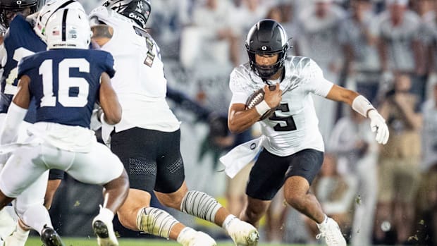 Oregon Ducks Dante Moore Quarterback NFL Draft Dan Lanning Penn State Overtime Arch Manning ESPN Heisman Trophy Winner No 1