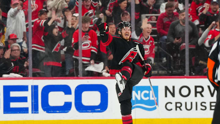May 10, 2025; Raleigh, North Carolina, USA; Carolina Hurricanes center Jack Roslovic (96) celebrates his goal against the Washington Capitals during the second period in game three of the second round of the 2025 Stanley Cup Playoffs at Lenovo Center. Mandatory Credit: James Guillory-Imagn Images