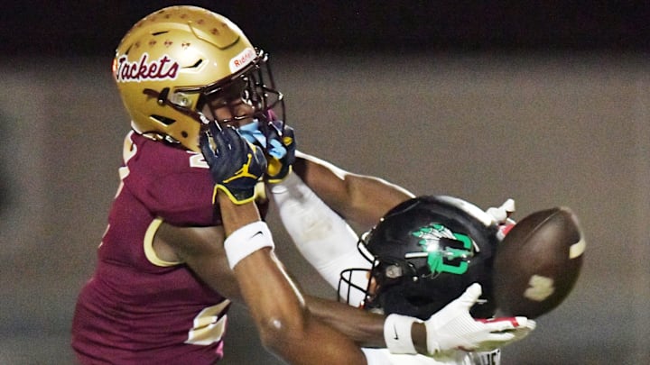 Choctawhatchee Indians' quarterback Keeson Hines-Wheeler (8) breaks up a second quarter pass intended for St. Augustine's Carl Jenkins Jr. (2). The Choctawhatchee Indians traveled to Saint Augustine High School to take on the Yellow Jackets in the FHSAA Region 1-3A High School Football Finals Friday, November 24, 2023. The Yellow Jackets led 21 to 17 at the half. [Bob Self/Florida Times-Union]