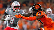 UNLV Rebels running back Jai'Den Thomas (9) stiff arms Oregon State Beavers defensive back Skyler Thomas (17) during an NCAA football game against UNLV at Reser Stadium