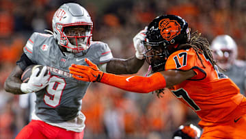 UNLV Rebels running back Jai'Den Thomas (9) stiff arms Oregon State Beavers defensive back Skyler Thomas (17) during an NCAA football game against UNLV at Reser Stadium on Saturday, Oct. 19, 2024, in Corvallis, Ore.