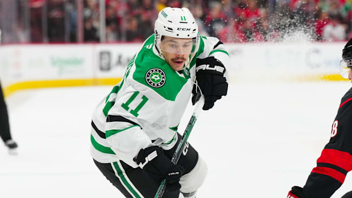 Nov 25, 2024; Raleigh, North Carolina, USA;  Dallas Stars center Logan Stankoven (11) skates against the Carolina Hurricanes during the second period at Lenovo Center. Mandatory Credit: James Guillory-Imagn Images