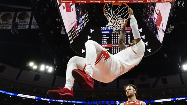 Mar 16, 2024; Chicago, Illinois, USA; Chicago Bulls center Andre Drummond (3) dunks the ball against the Washington Wizards during the second half at United Center.