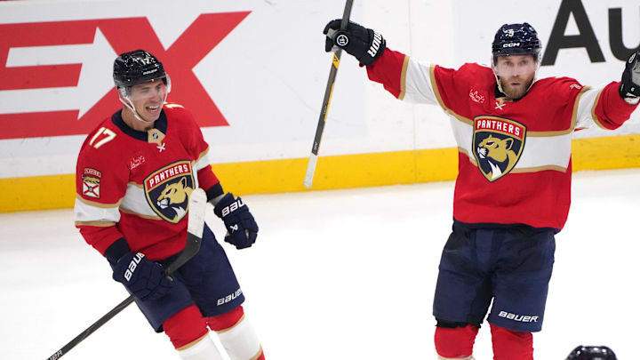 Dec 6, 2025; Sunrise, Florida, USA; Florida Panthers center Sam Bennett (9) celebrates the winning goal in overtime against the Columbus Blue Jackets with left wing Brad Marchand (63) and center Evan Rodrigues (17) at Amerant Bank Arena. Mandatory Credit: Jim Rassol-Imagn Images Dec 6, 2025; Sunrise, Florida, USA; Florida Panthers center Sam Bennett (9) celebrates the winning goal in overtime against the Columbus Blue Jackets with left wing Brad Marchand (63) and center Evan Rodrigues (17) at Amerant Bank Arena. Mandatory Credit: Jim Rassol-Imagn Images