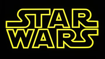In this photo illustration, a Star Wars logo is seen on a...