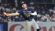 Jul 28, 2025; Bronx, New York, USA; Tampa Bay Rays shortstop Taylor Walls (6) throws the ball to first base for an out during the ninth inning against the New York Yankees at Yankee Stadium. 