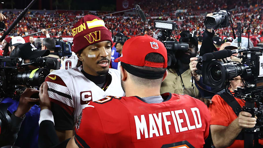 Washington Commanders quarterback Jayden Daniels greets Tampa Bay Buccaneers quarterback Baker Mayfield. | Kim Klement Neitzel-Imagn Images