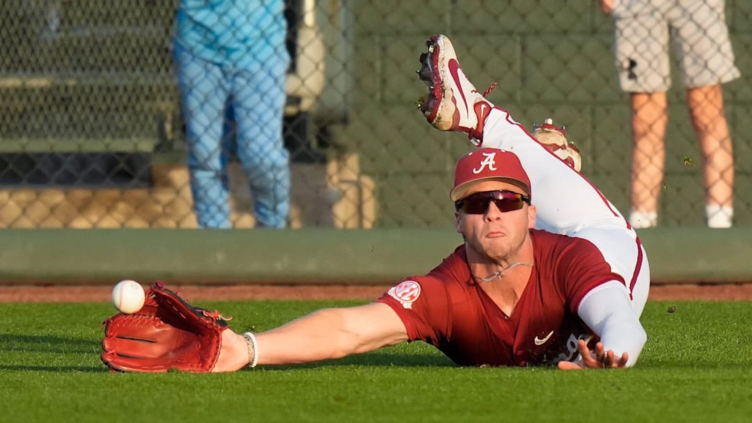 Alabama outfielder Kade Snell (3) makes a diving try but can’t come up with the ball during the game with Mississippi State at Sewell-Thomas Stadium in Tuscaloosa Friday, April 11, 2025.
